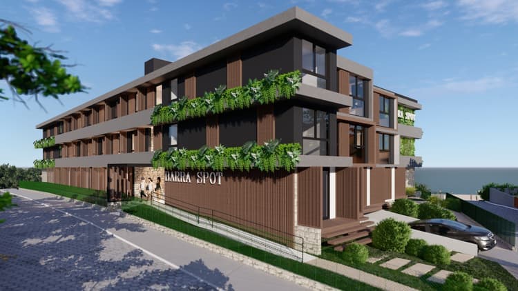 Edificio moderno con pannelli in legno, balconi ricchi di piante e insegna Barra Spot.